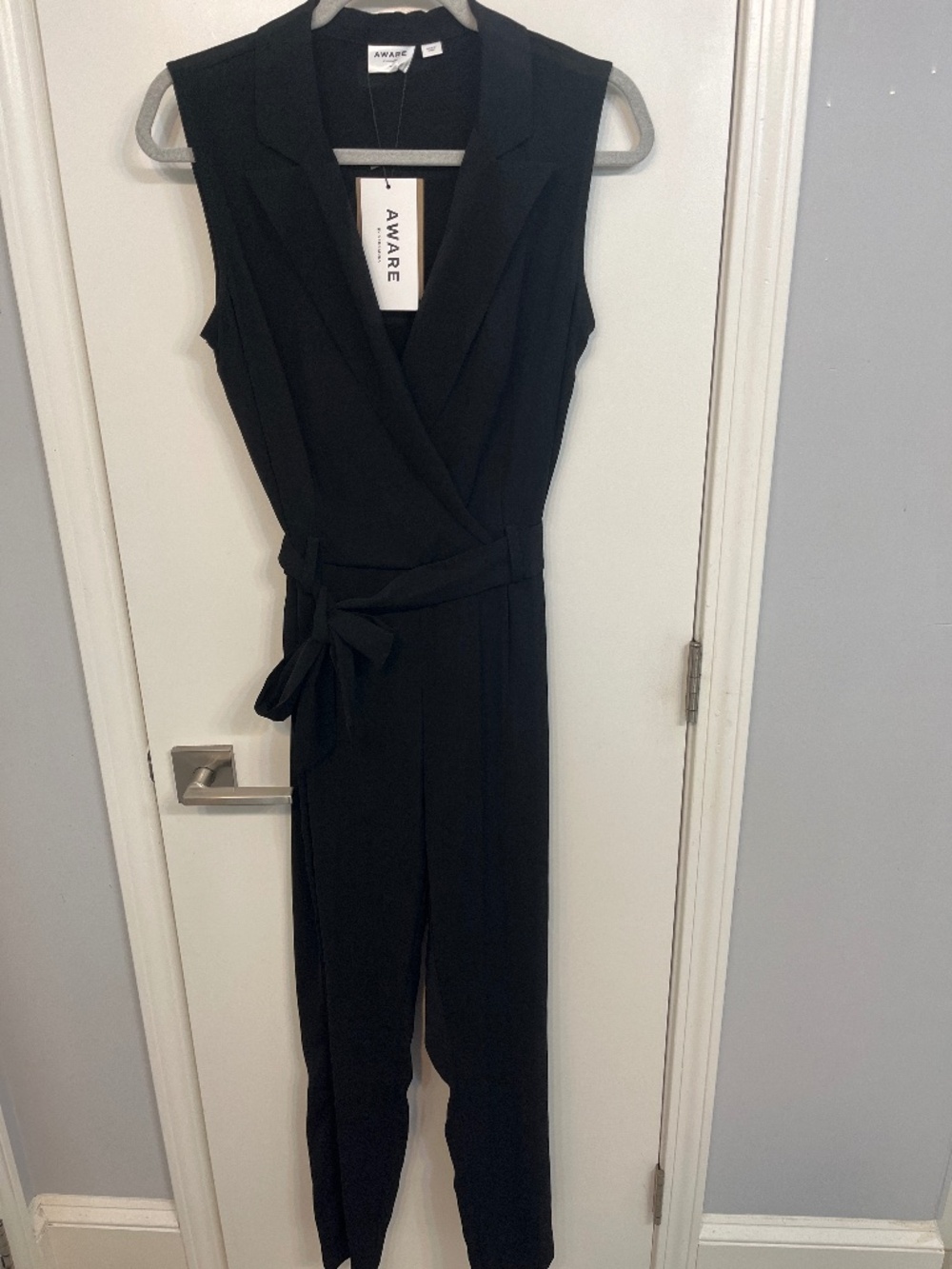 Vero Moda black belted jumpsuit. NWT size M